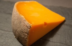 Ακάρεα (καφέ στρώση) πάνω σε τυρί